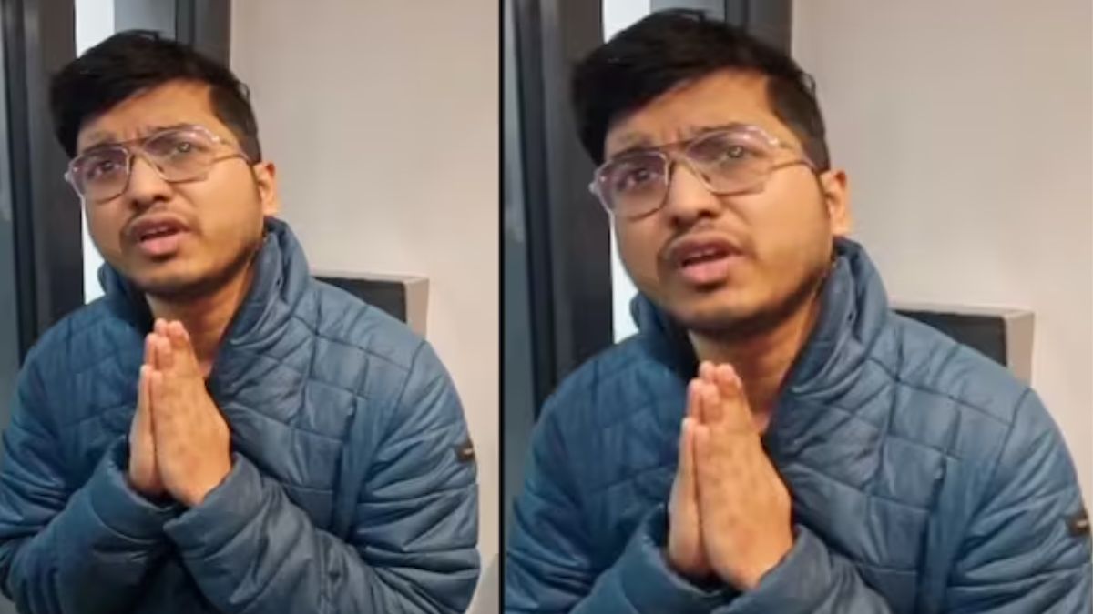 Police detaining the student outside accommodation