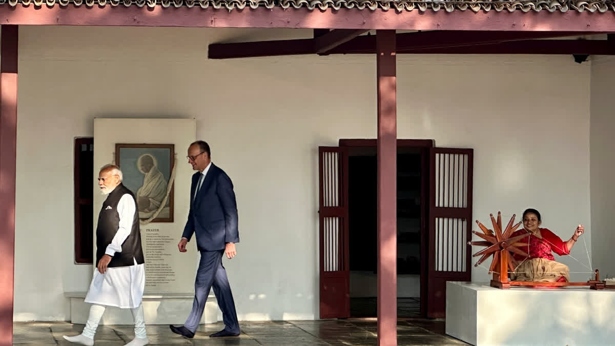 Merz and Modi flying kites together at Sabarmati Riverfront
